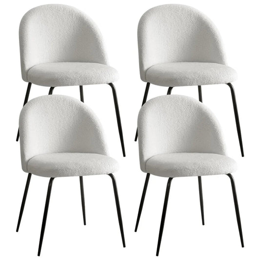 Set of four white dining chairs
