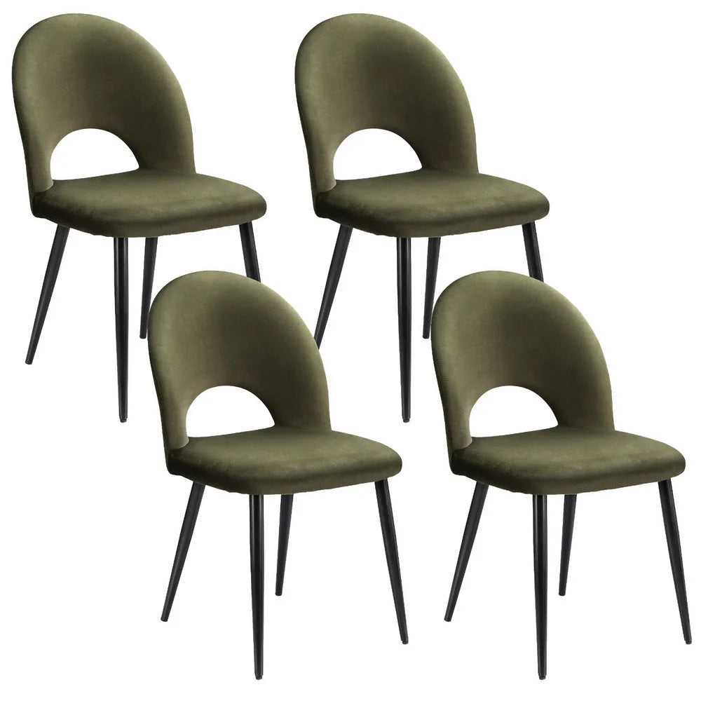 Set of four green velvet dining chairs