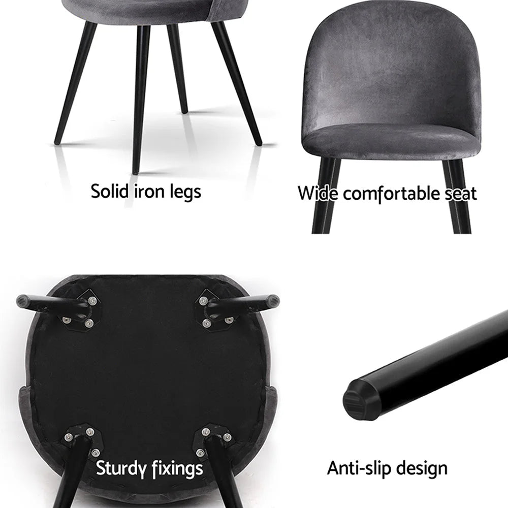 Set of four grey velvet dining chairs