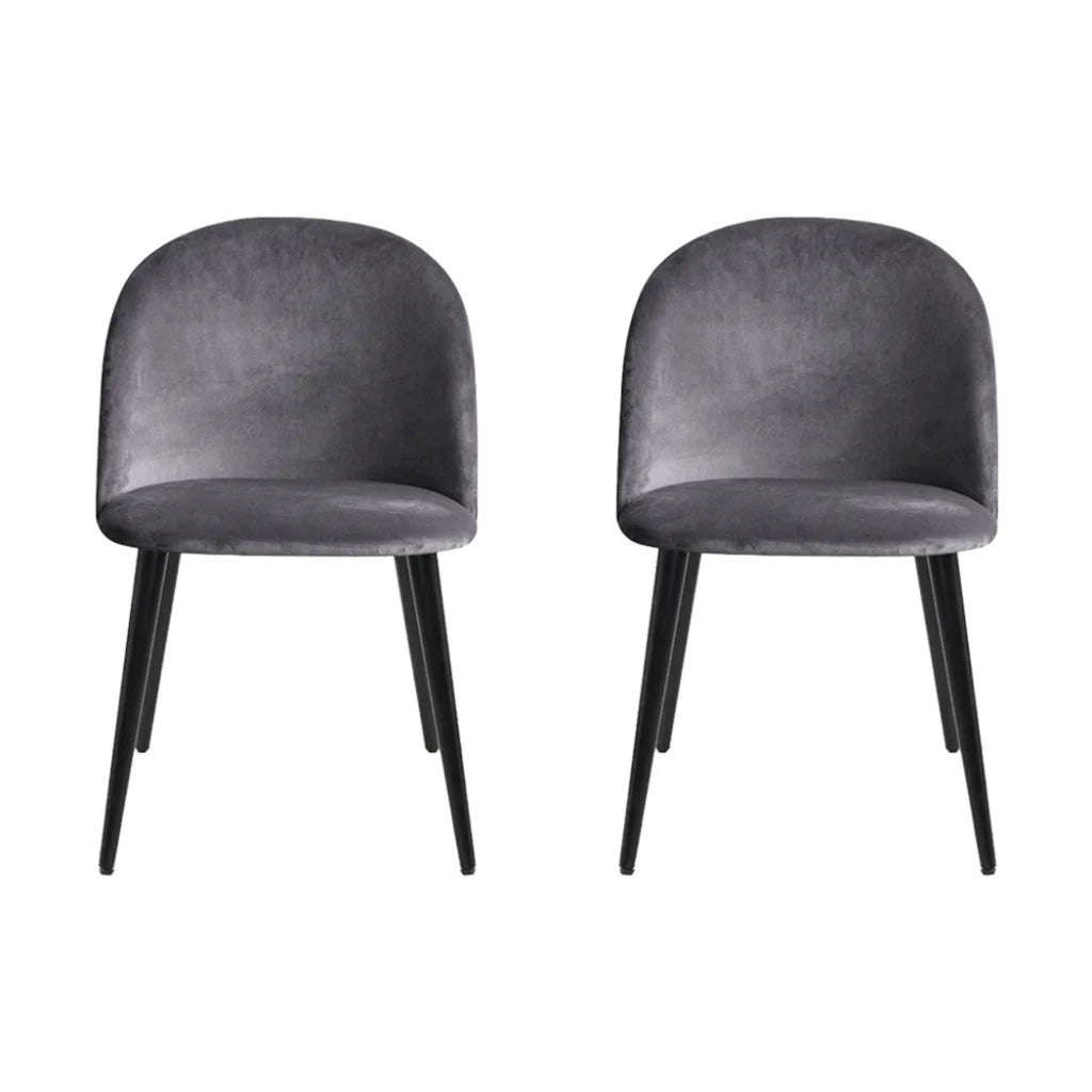 Set of four grey velvet dining chairs