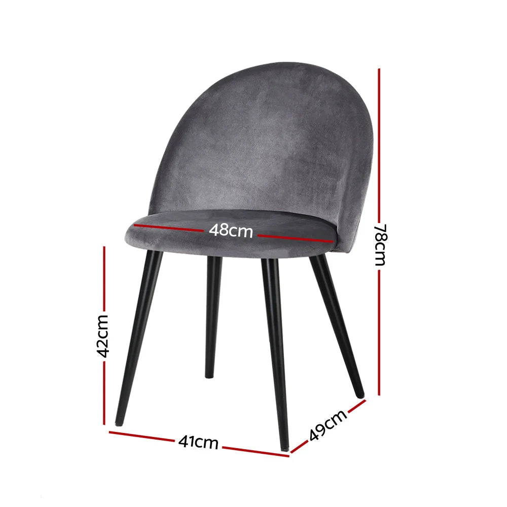 Set of four grey velvet dining chairs