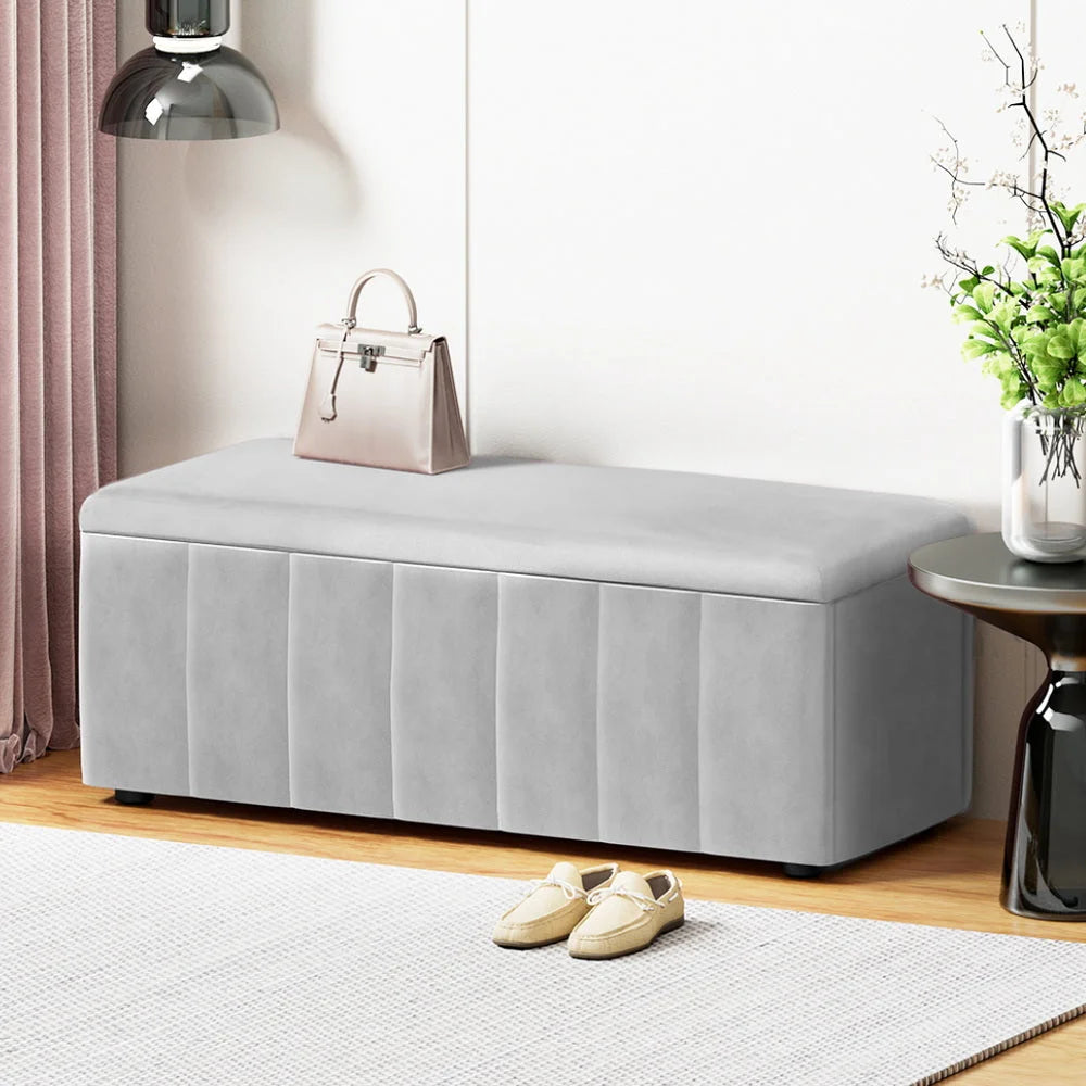 Grey velvet storage ottoman