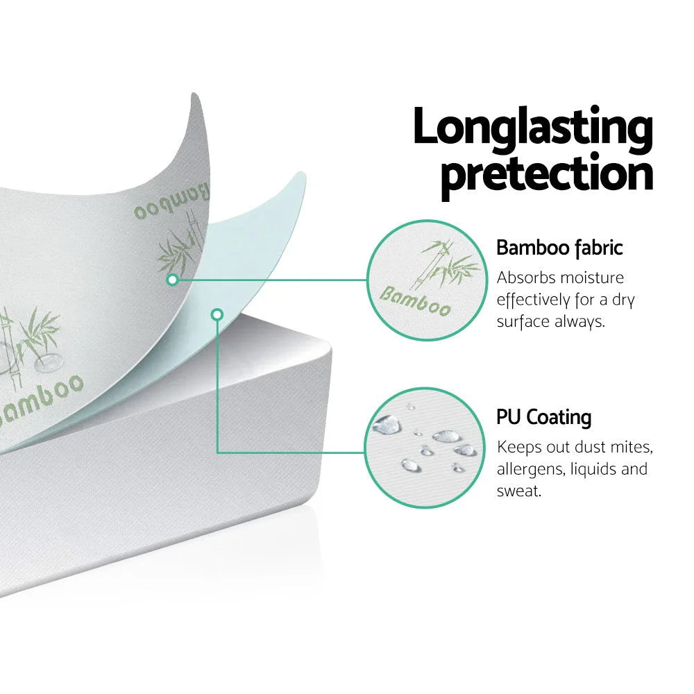Bamboo mattress topper with front fabric panel and stitched edging
