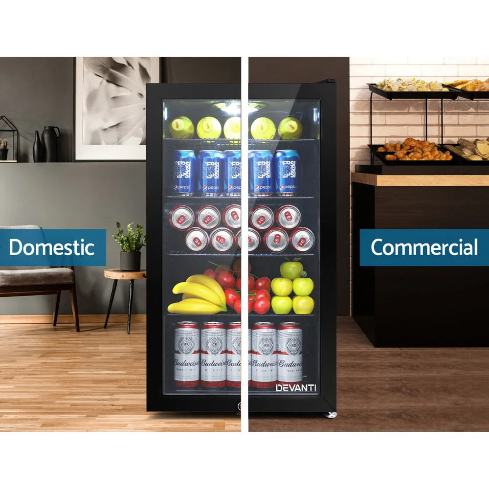 Mini bar fridge with black door and internal shelf area