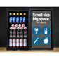 Mini bar fridge for chilled drinks and small kitchen storage