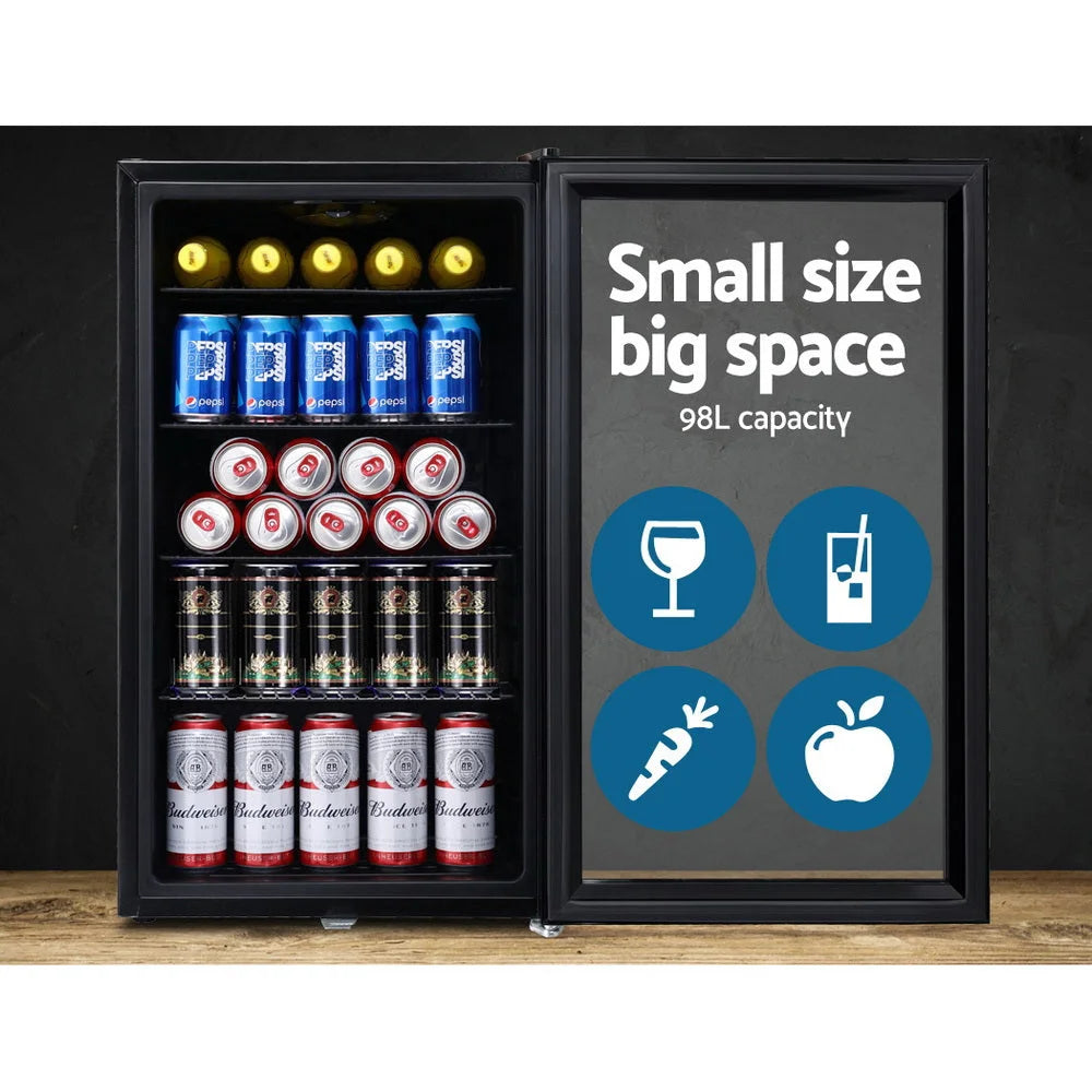 Mini bar fridge for chilled drinks and small kitchen storage