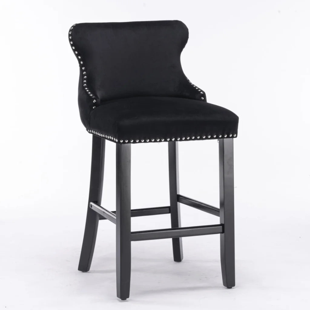 Black velvet bar stool set with chair legs and seat detailing