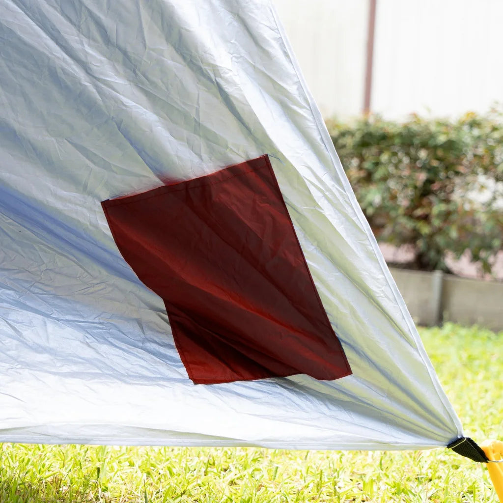 Red 4m beach umbrella havana with colour and construction cues