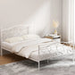 White metal bed frame with double size groa base