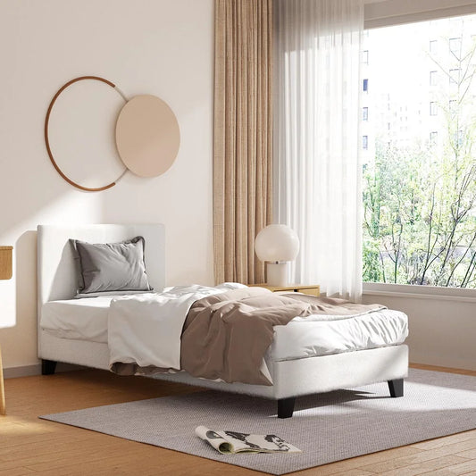 Fabric mattress with rolled edge and quilted finish