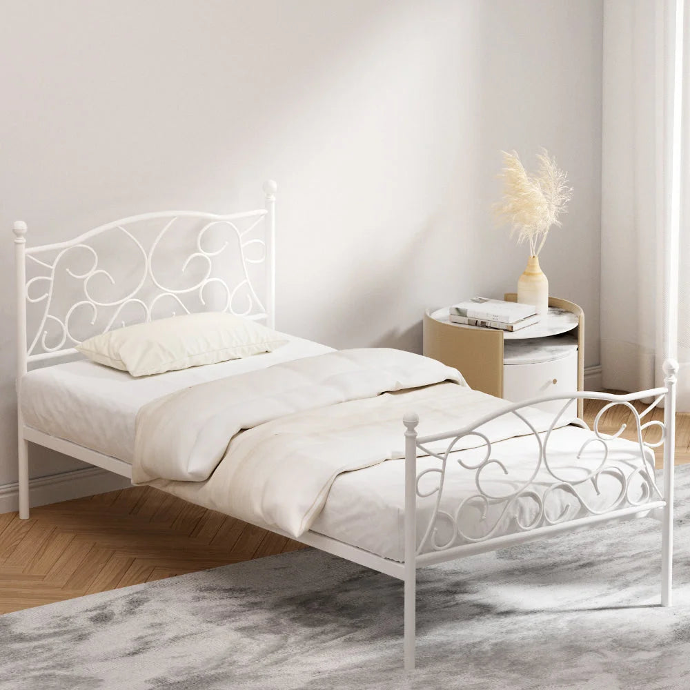 White metal bed frame with single size groa base