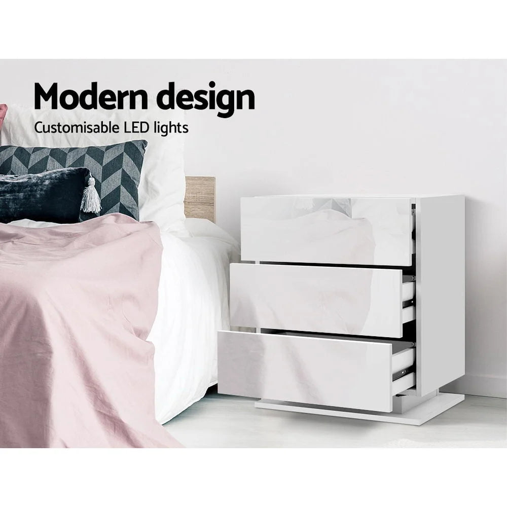White bedside table unit with key surfaces and edge shape