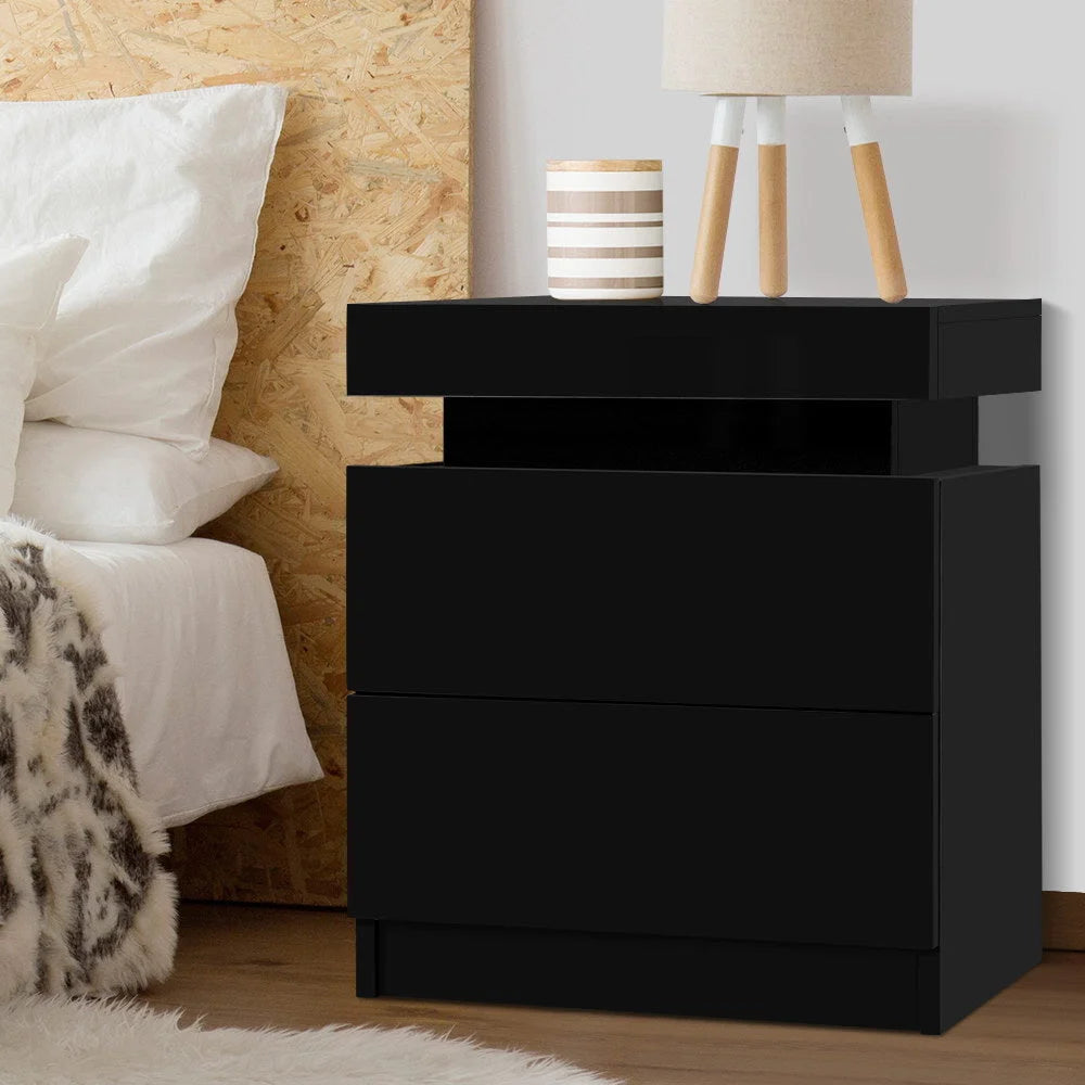 Black wood bedside table with compact cabinet and drawer handles