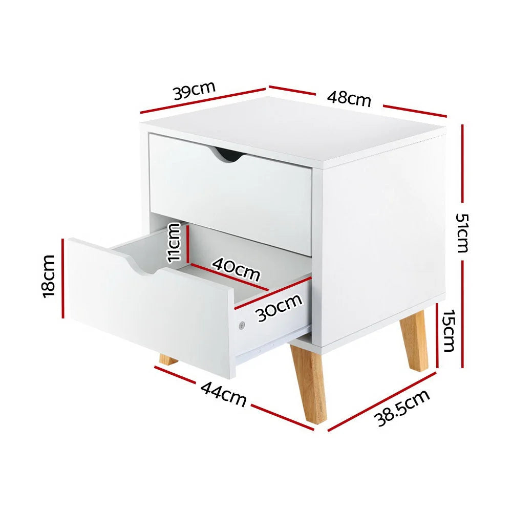 White wooden bedside tables set with matching accessories and clear item layout