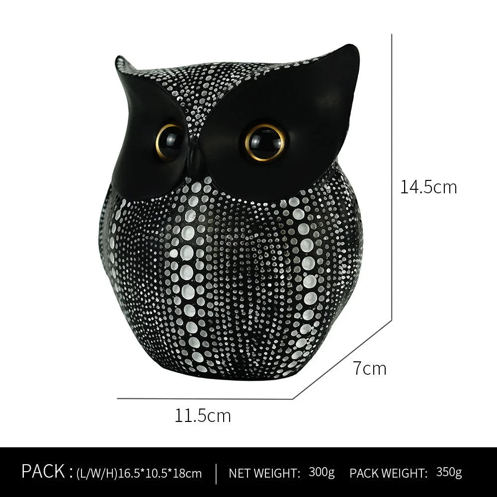Black resin owl statue - modern perforated design