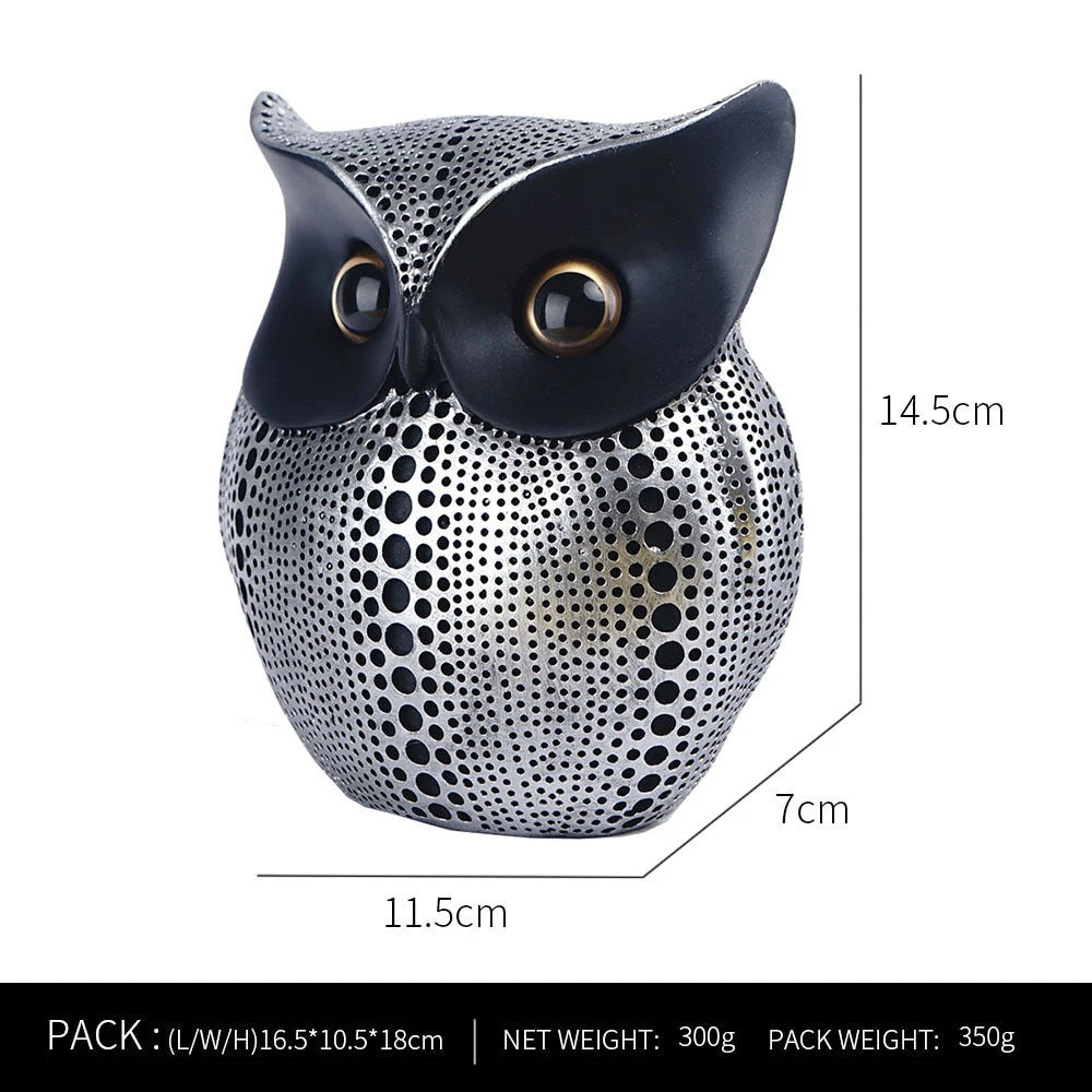 Black silver resin owl statue - modern perforated design
