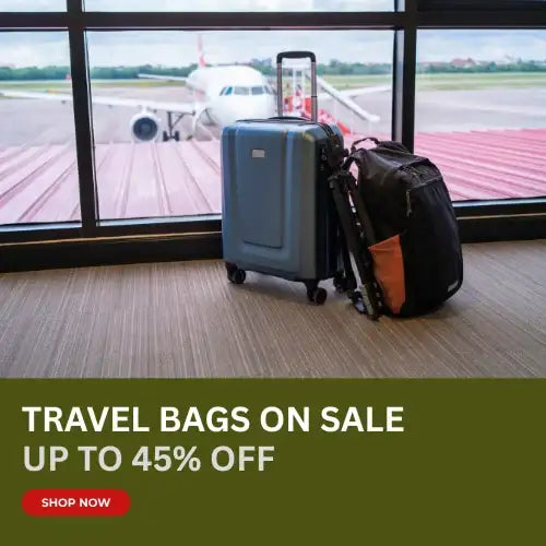 Blue hard-shell suitcase with retractable handle and four wheels.