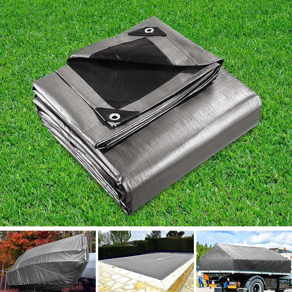 Silver 6x7 camping tarp heavy with assembled layout and visible hardware
