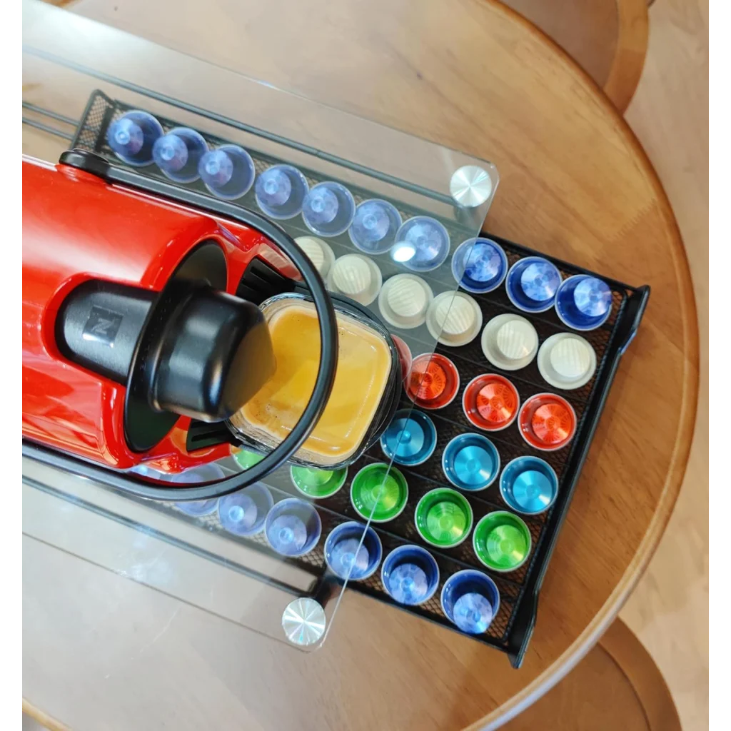 Glass carla coffee pod with pack contents and accessory layout