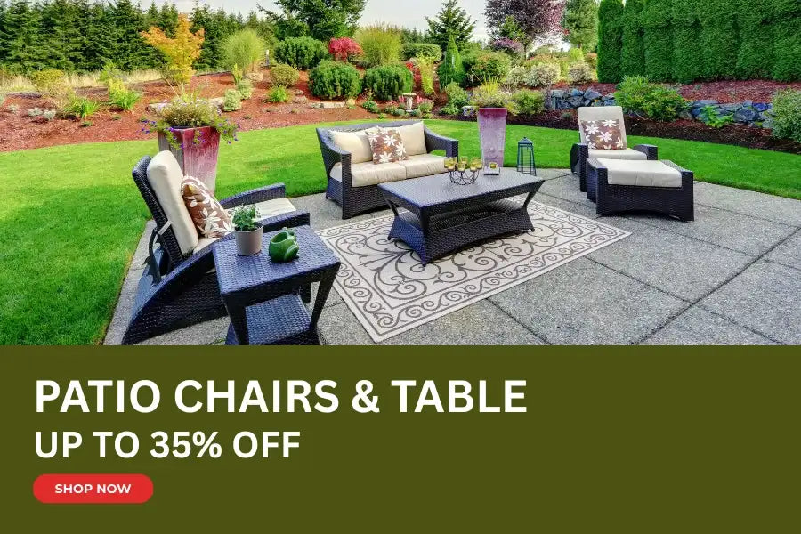 Dark wicker patio set with cream-colored cushions and patterned throw pillows.