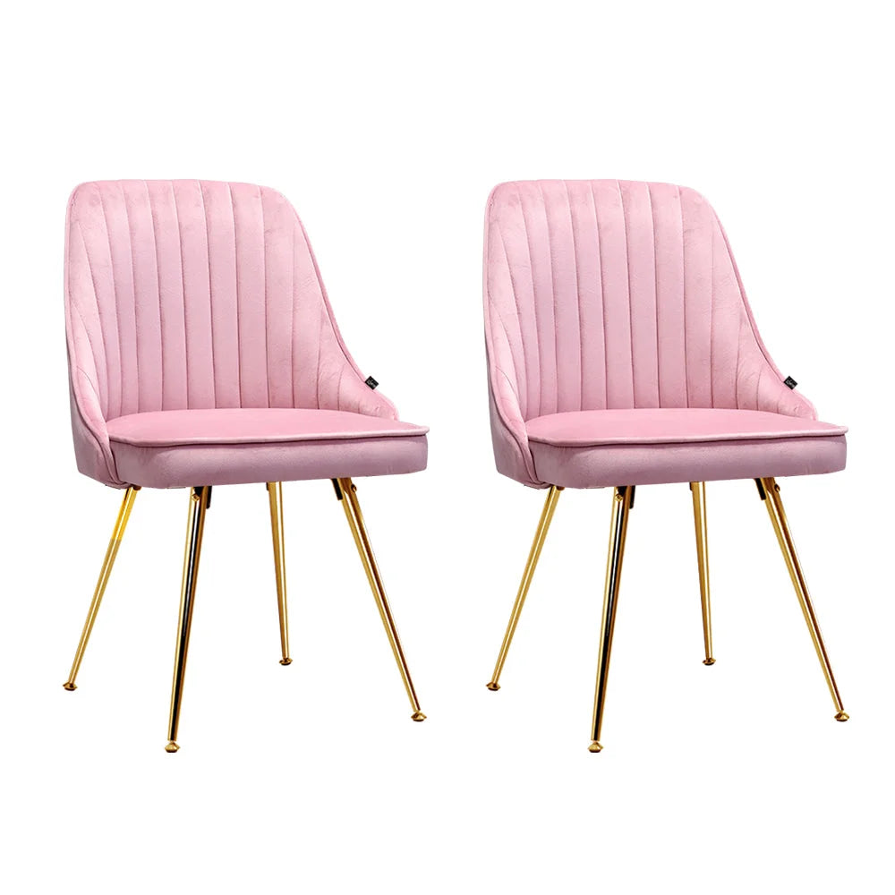 Pink velvet dining chair set with seat padding and sturdy legs