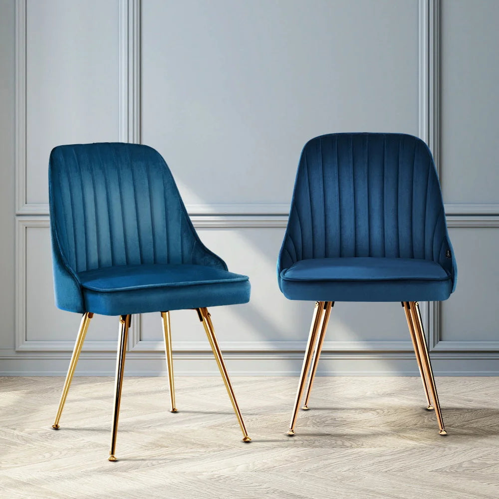 Set of two blue velvet dining chairs