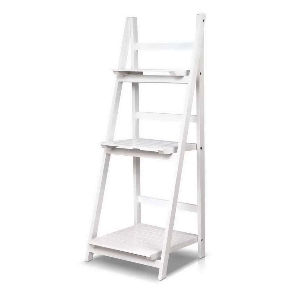 White wooden storage rack with open shelves and sturdy supports