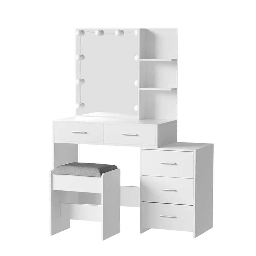 White dressing table vanity with matching accessories and clear item layout