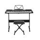 Piano keyboard with white keys and black top control panel