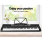 Piano keyboard with keyboard keys and black music stand