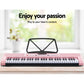 Pink piano keyboard with keyboard keys and black music stand