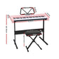 Pink piano keyboard with electronic keyboard and folding stand