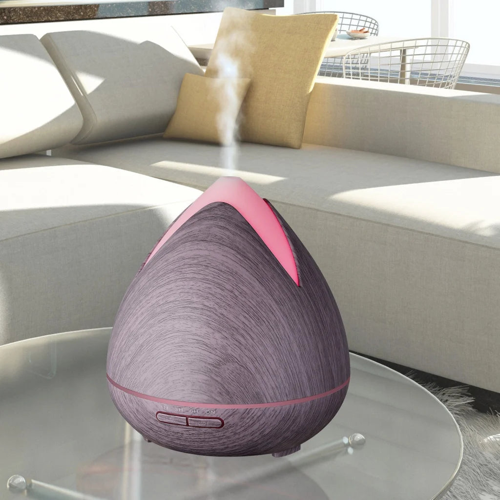 Essential oil diffuser with caster wheels and side handle rail