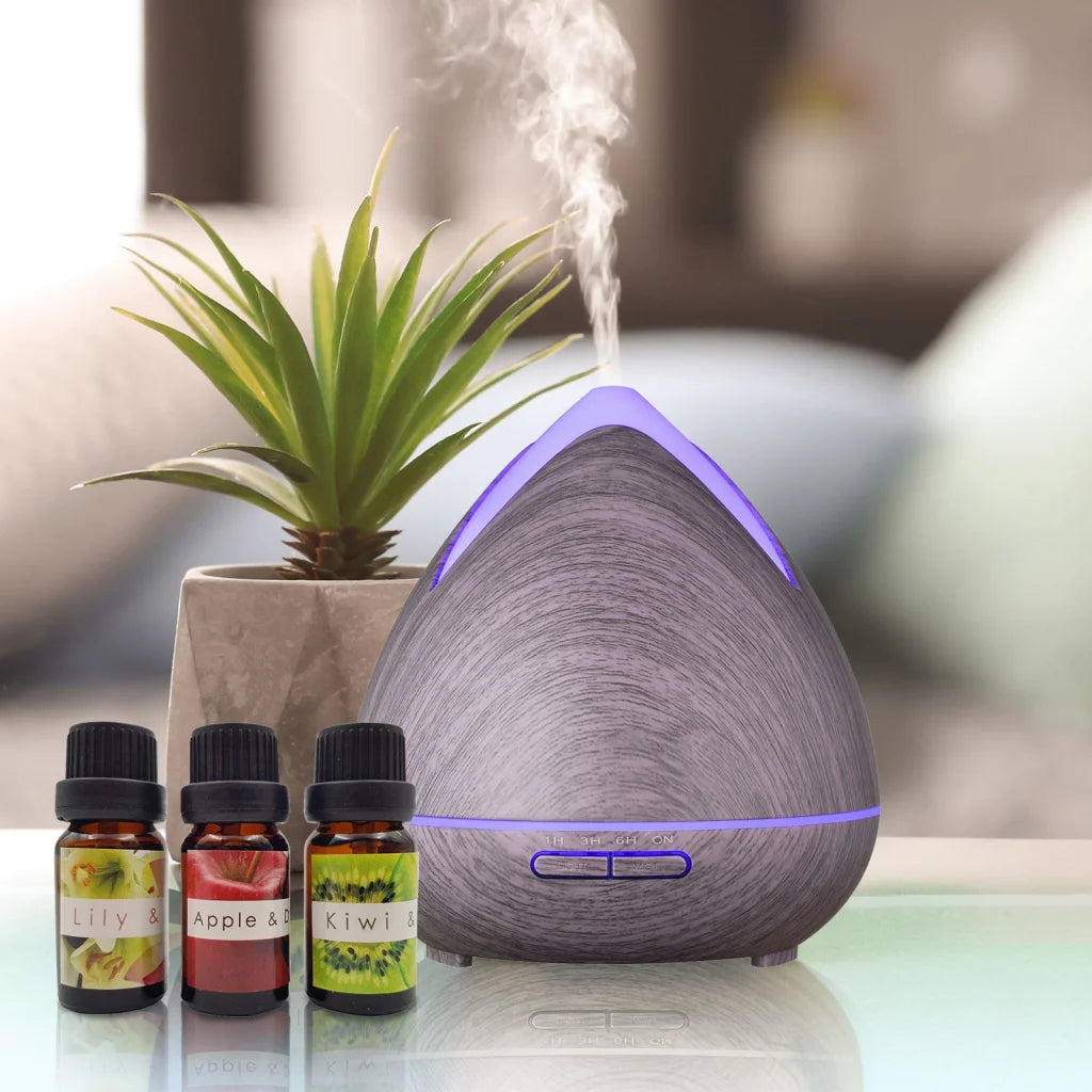 Essential oil diffuser with storage shelves and support legs