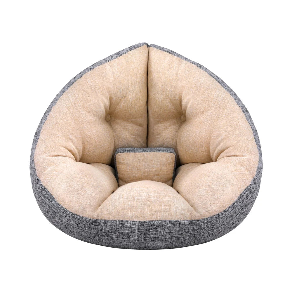 Beige floor lounge sofa with caster wheels and side handle rail