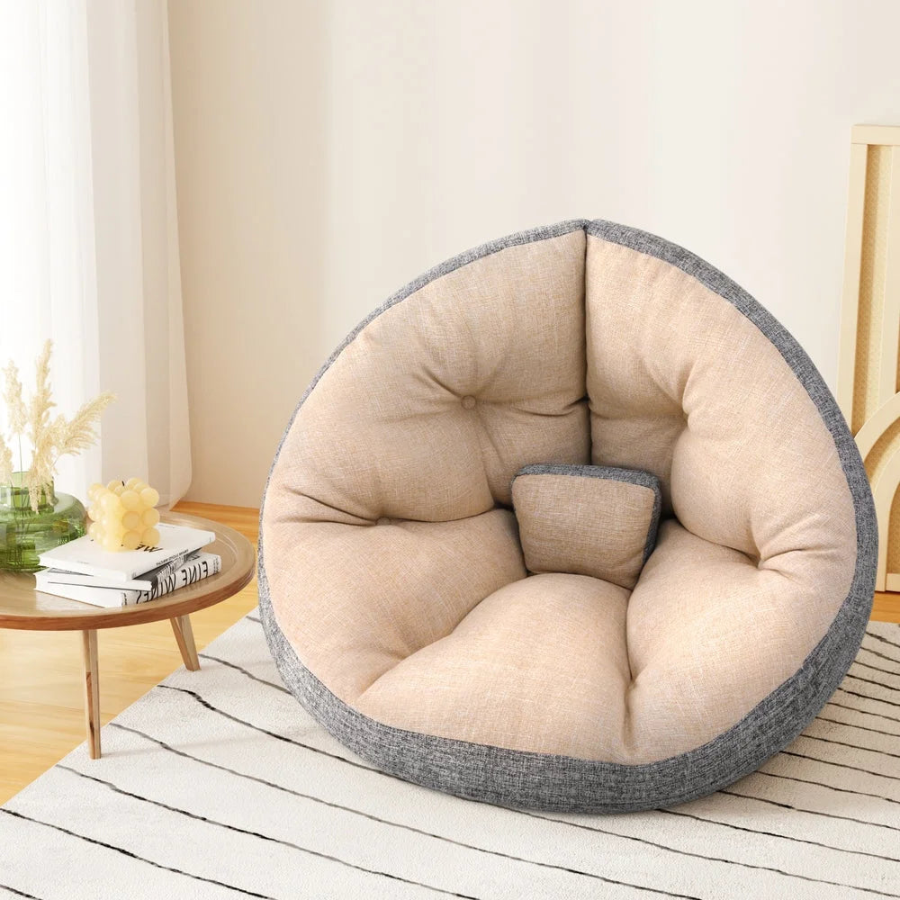 Beige floor lounge sofa with padded floor sofa and adjustable back sections