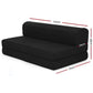 Black foam mattress with layered cushioning and fabric casing