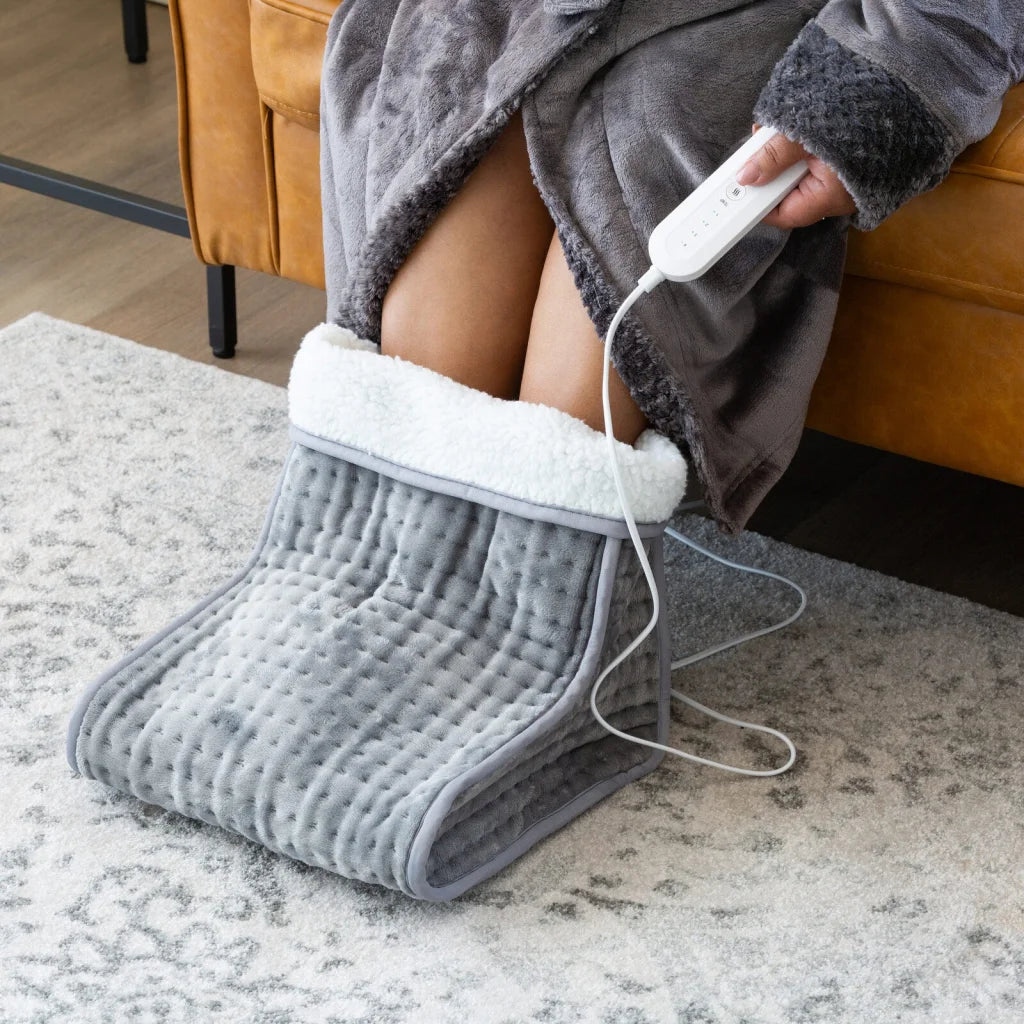 Foot warmer plush with caster wheels and side handle rail