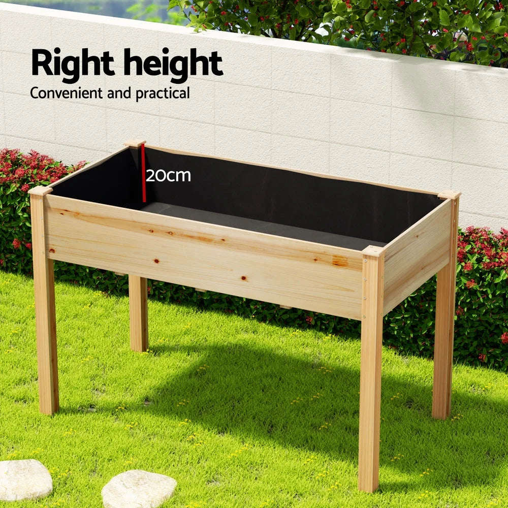 Wooden raised garden bed with long planter box for vegetable growing