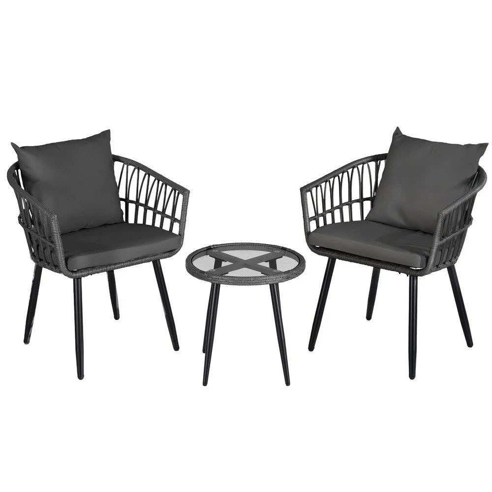 Grey outdoor lounge set with woven seating and matching table