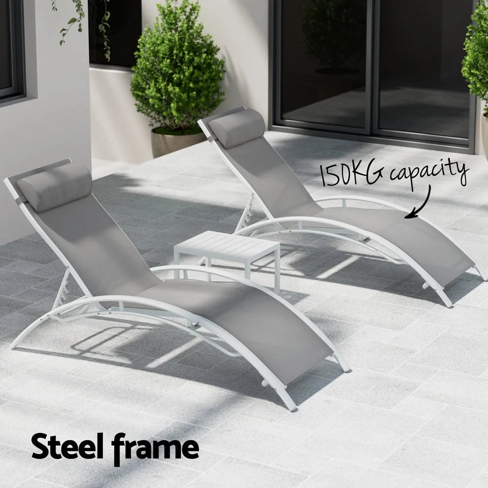 Steel outdoor sun lounge with patio sun chair and matching low table