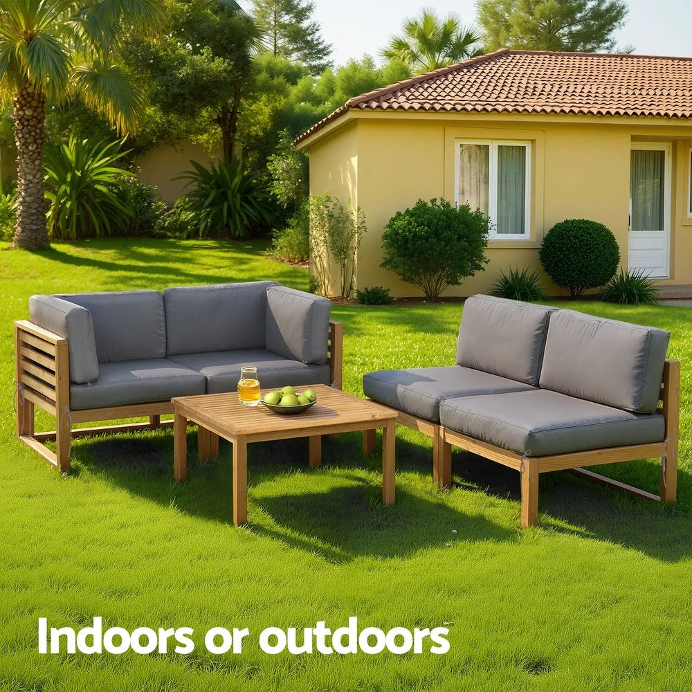 Wooden piece outdoor sofa with seat cushions and low coffee table
