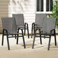 Set of four grey dining chairs