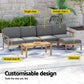 Wooden outdoor lounge set with corner chair and low table pieces