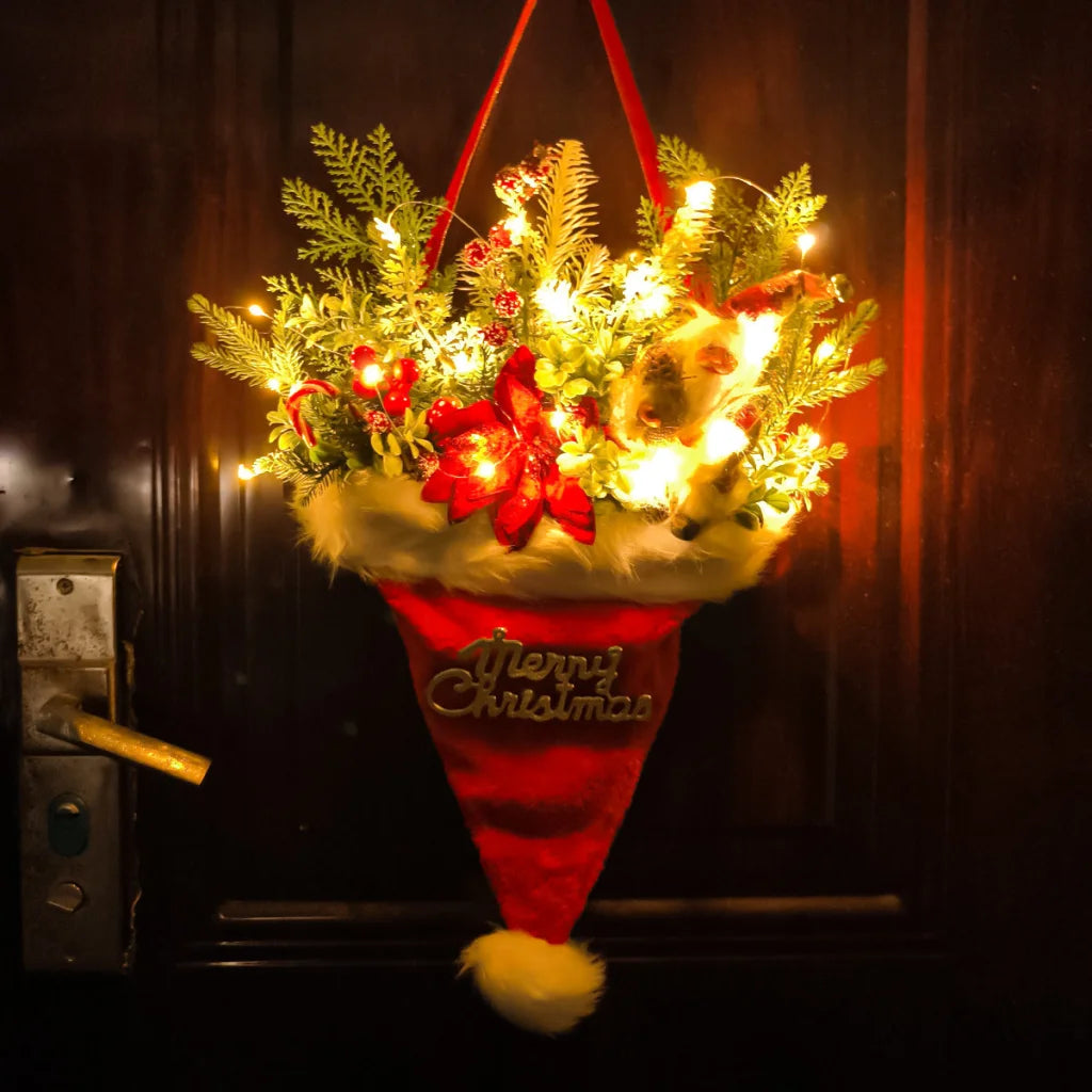 Illuminated Santa Hat Door Hanger with Holiday Greenery &