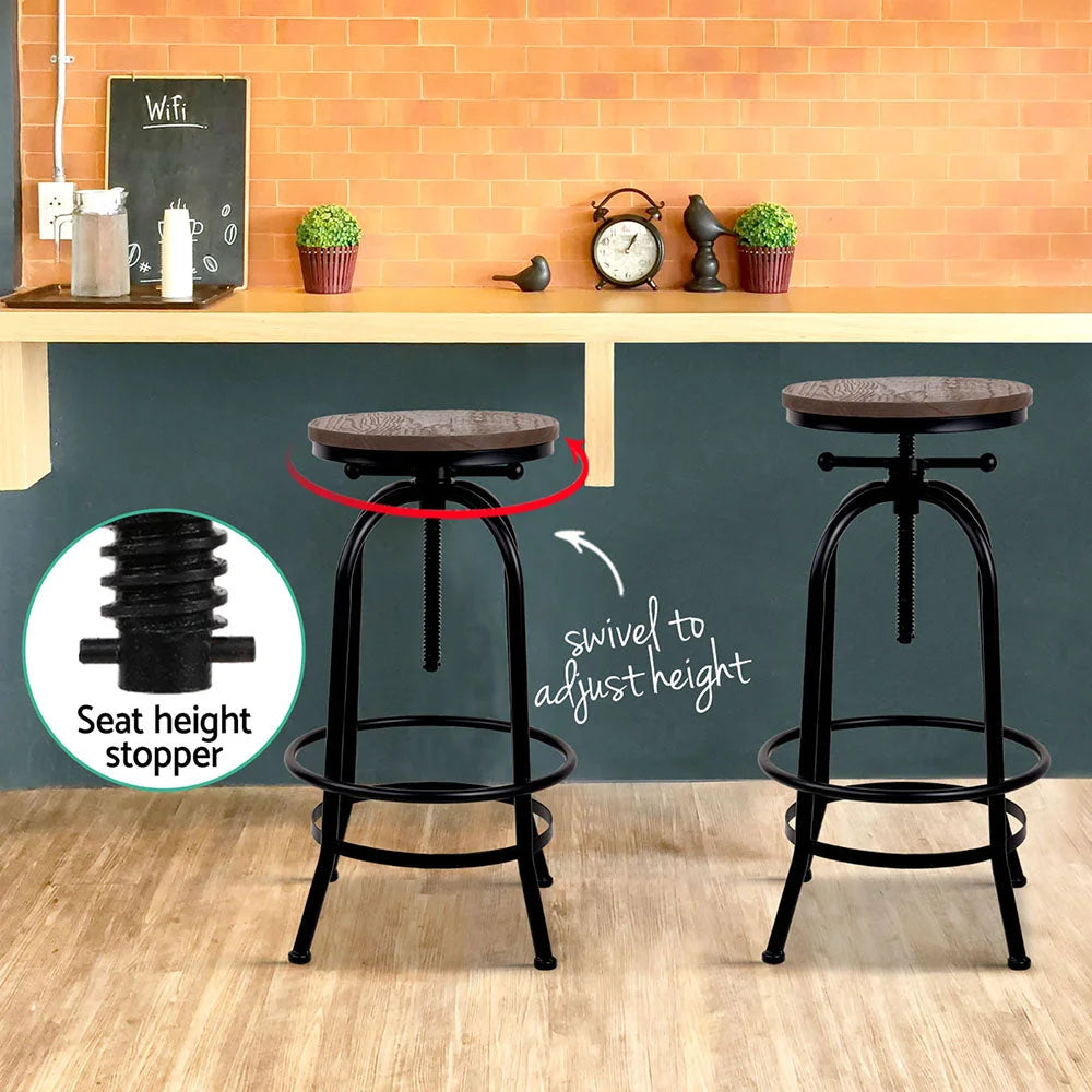 Industrial bar stool with cushioned seat and curved backrest