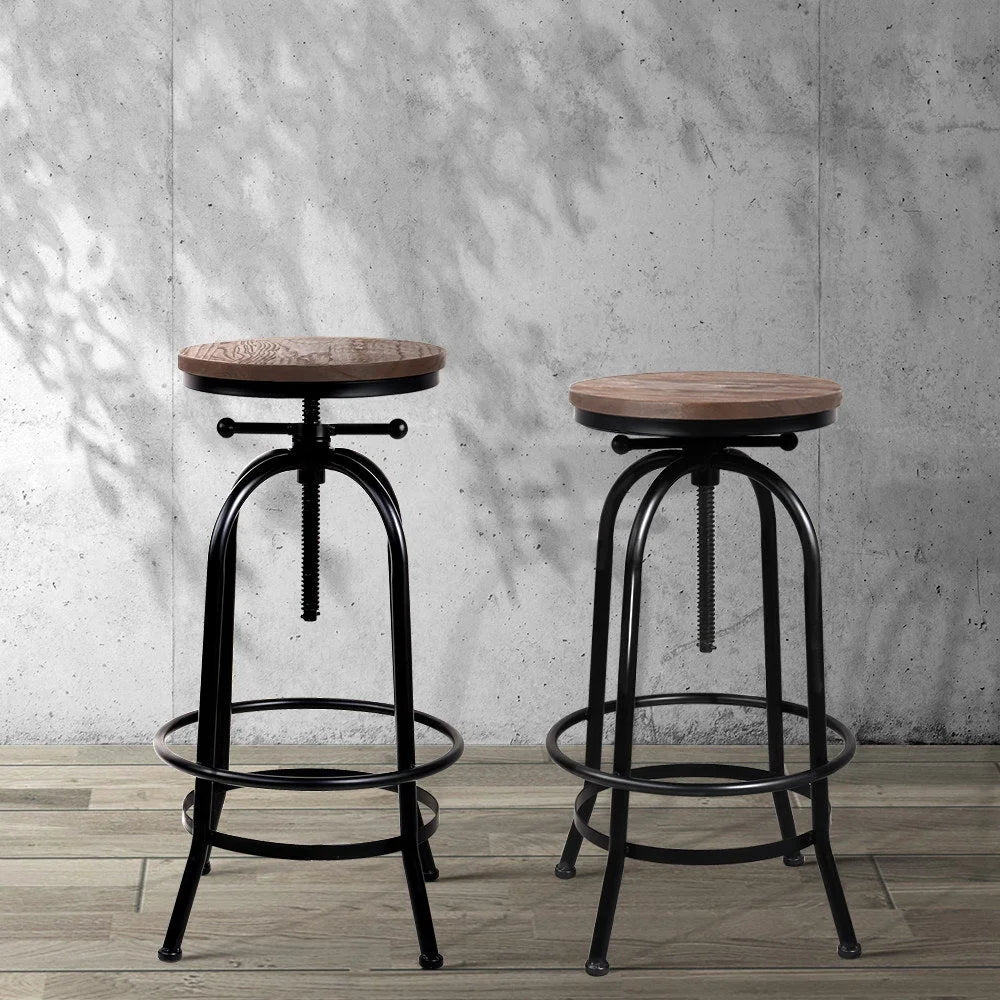Industrial bar stool with counter-height legs and footrest