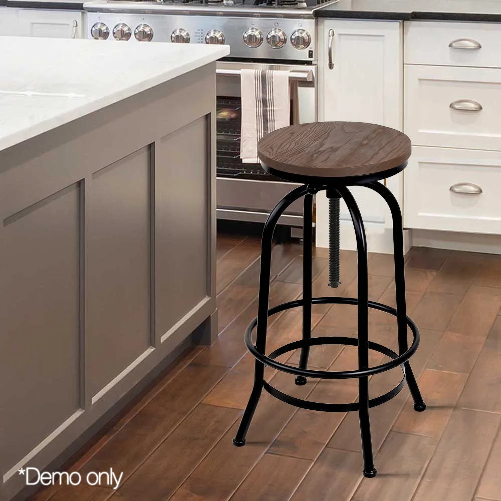 Black wood industrial bar stool with seat padding and sturdy legs