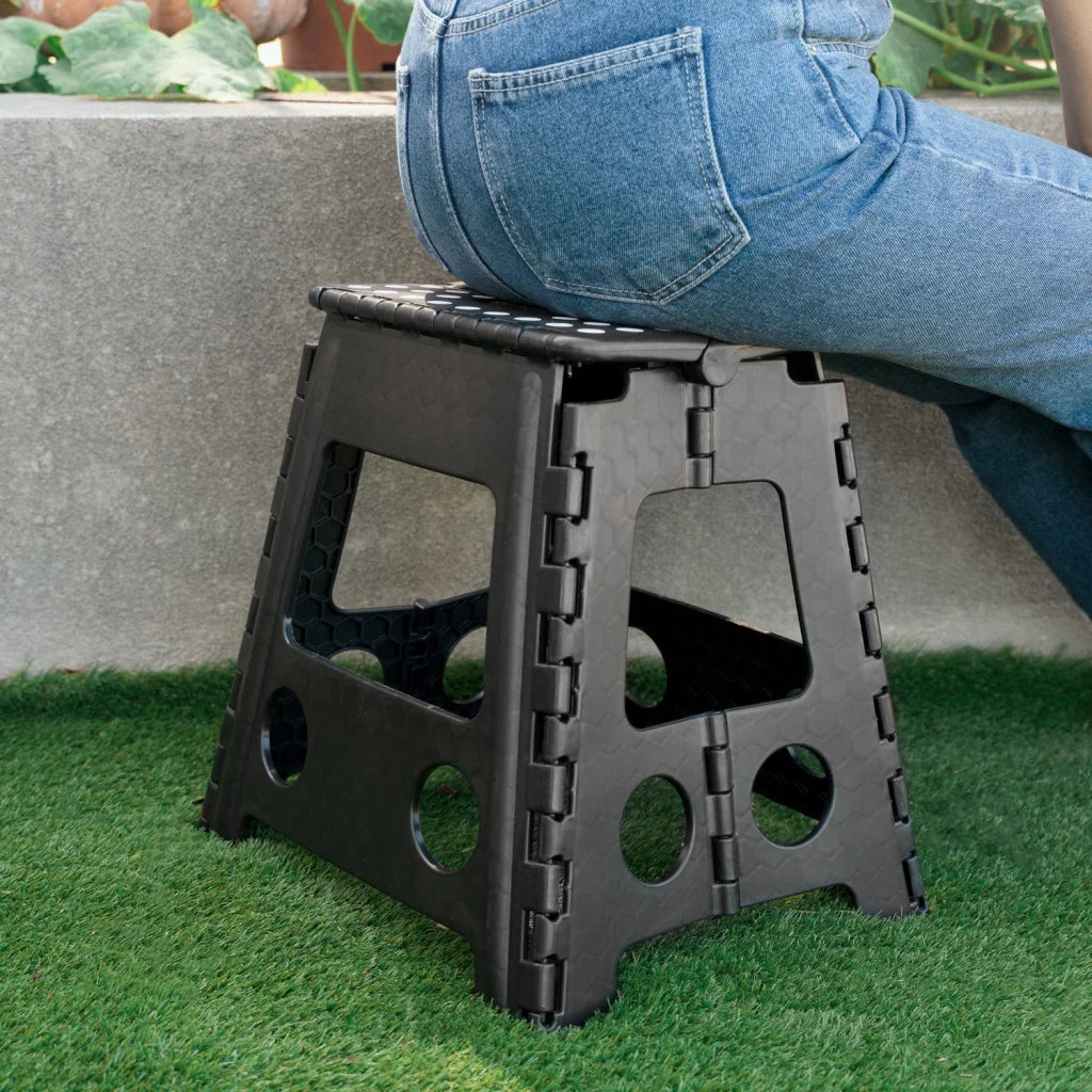 Chair with large folding stool store flat