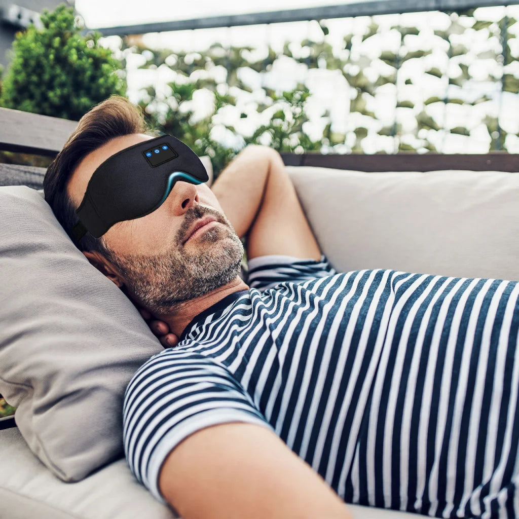 Black laser sleep mask with matching accessories and clear item layout